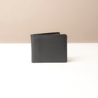 Black leather wallet on a white background