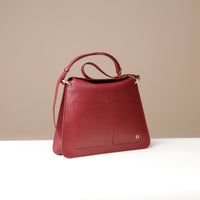Penelope Sr. bag in red – structured square leather handbag with minimalist front design