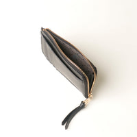 Black and gold card case wallet on a white background