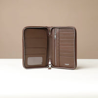 Open view of a Brown Danilos Pebble leather Document Portfolio Alfaro with eight card slots, zipper pocket and one main pocket with three card slots