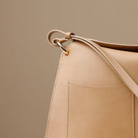 beige handcrafted designer purse