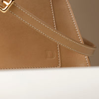 beige handcrafted designer purse