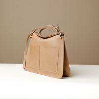 beige quiet luxury handcrafted designer purse