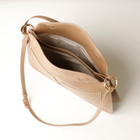 beige handcrafted designer purse