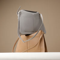 Ivory Penelope Sr. structured leather handbag – square design with clean stitching and minimal logo detail