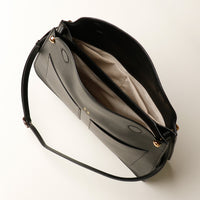 Interior view of black Penelope Sr. handbag – spacious, lined, and handcrafted in Honduras
