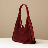 Front-facing burgundy Mia Minimale – sculptural suede shoulder bag by Danilo’s