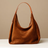 Tan Suede Mia Minimale – slouchy hobo bag with sculpted silhouette and adjustable leather strap