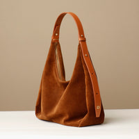 Suede Mia Minimale in tan – minimalist suede hobo bag with adjustable leather strap and slouchy silhouette