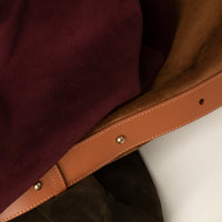 Detail of burgundy and tan suede – Mia Minimale strap stitching and suede grain texture