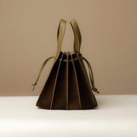 Top-handle view of tan Suede Papillon Sr. – luxury suede handbag with soft volume