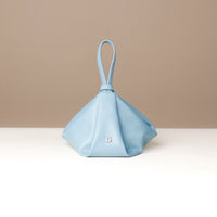 Blue Silueta Bag – modern sculptural leather wristlet handcrafted in Honduras