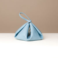 Silueta Bag in light blue – folded geometric design with soft interior and luxury stitching