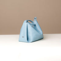 Silueta Bag in light blue – folded geometric design with soft interior and luxury stitching