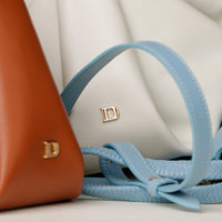 Side-by-side Danilo’s Silueta Bags – statement leather accessories in modern colors