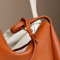 Side-by-side Danilo’s Silueta Bags – statement leather accessories in modern colors