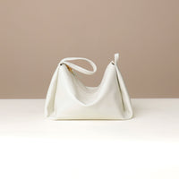 Interior view of ivory Silueta Bag – soft lining with functional compartments