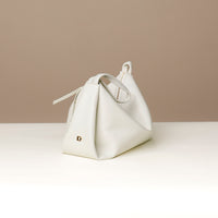 Ivory Silueta Bag by Danilo’s – sculpted leather handbag with minimalist top handle