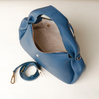 Aurora Soft Bag in blue – top-down view showing interior lining and detachable strap