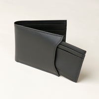 Front of a black nappa leather Milano wallet with a card case holder that comes out of one of the sides