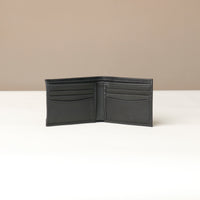 Front view of a open black nappa leather Milano wallet with nine visible slots