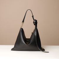 Zesté Crossbody Lux in black – convertible leather shoulder and top-handle bag with adjustable strap, handcrafted by Danilo’s