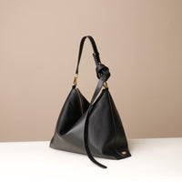 Zesté Crossbody Lux in black leather – convertible luxury crossbody, shoulder, and top-handle designer bag by Danilo’s