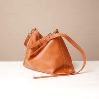 Side profile of Danilo’s Zesté Crossbody Lux – structured mid-size designer bag with premium European leather