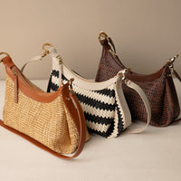 Four handbags Mini Mia 26 Raffia handcrafted with raffia and leather, with different designs and colors on a neutral background