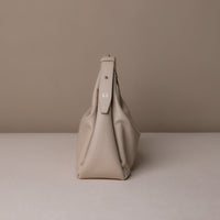 Hobo-bag-handbag-Mini-Mia-Minimale-Leather-Arena-Beige-Lateral-View-With-Brand-Danilos
