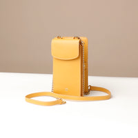 side view of a open yellow danilos leather multi smartphone alessia over a white background
