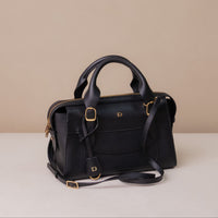 Handbag-satchel-nara-leather-black-with-strap-back-front-angled-view