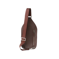 Back view of a chocolate brown sling pack andres with silver zipper, visible strap and the Danilos logo over a white background