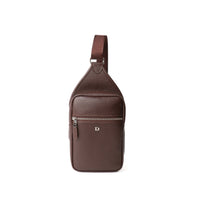 front view of a chocolate brown sling pack andres with a silver zipper and the Danilos logo over a white background