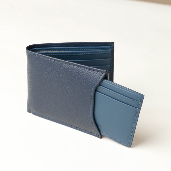 Front of a Blue pebble leather Milano wallet with card case holder that comes out of one of the sides