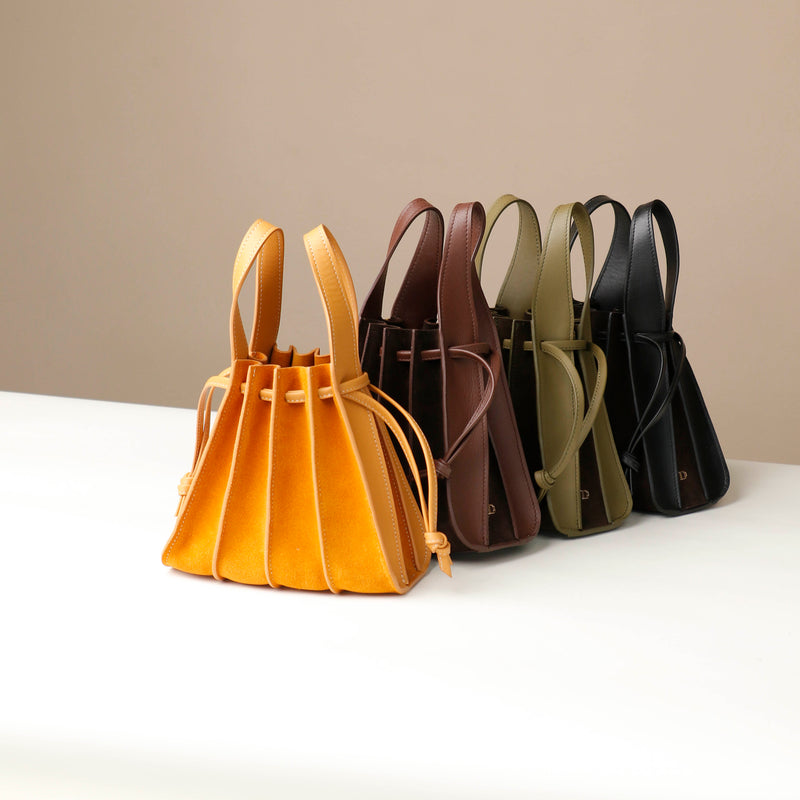 files/bucket-bag-mini-papillon-black-yello-green-brown-suede-leather-danilos_1.jpg