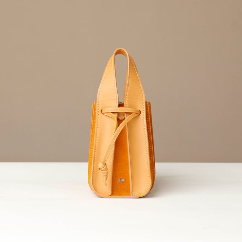 files/bucket-bag-mini-papillon-yellow-suede-leather-danilos_2.jpg