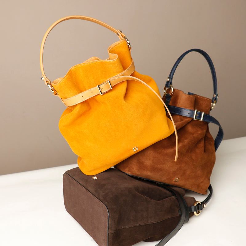files/bucket-bag-sophie-brown-black-yellow-suede-leather-danilos_1.jpg