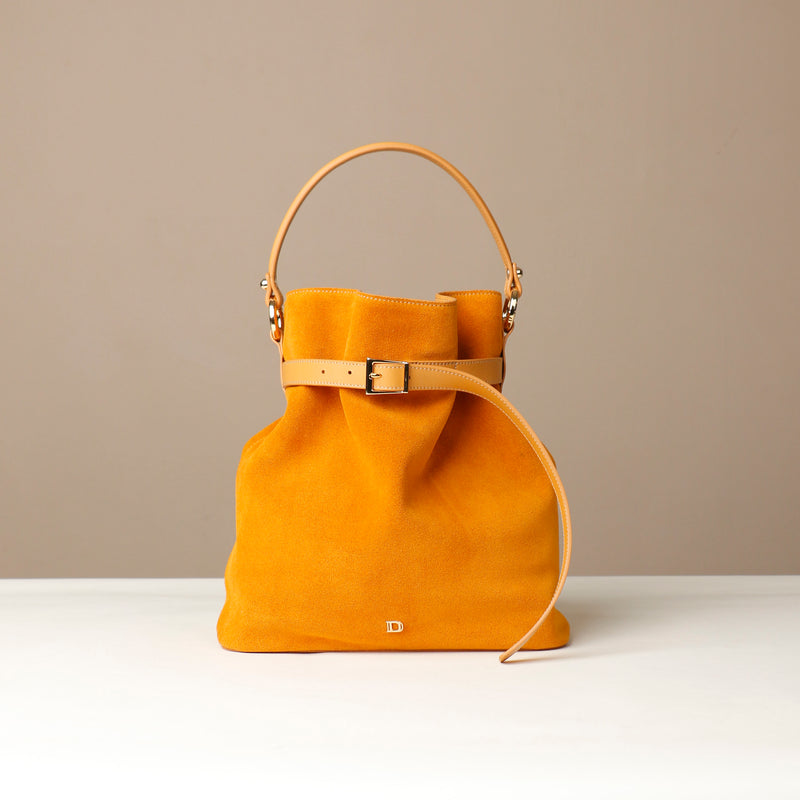 files/bucket-bag-sophie-yellow-suede-leather-danilos_d15e477e-c62c-474c-a2aa-d626d7a6e165.jpg