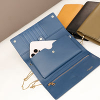 open danilos clutch versaviva in blue leather with pouch for phone and card slots with gold zipper