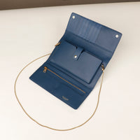 open danilos clutch versaviva in blue leather with pouch for phone and card slots with gold zipper and chail