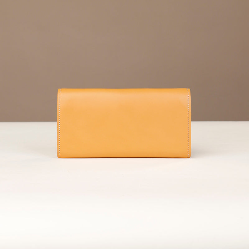 files/clutch-versaviva-yellow-leather-danilos-4.jpg