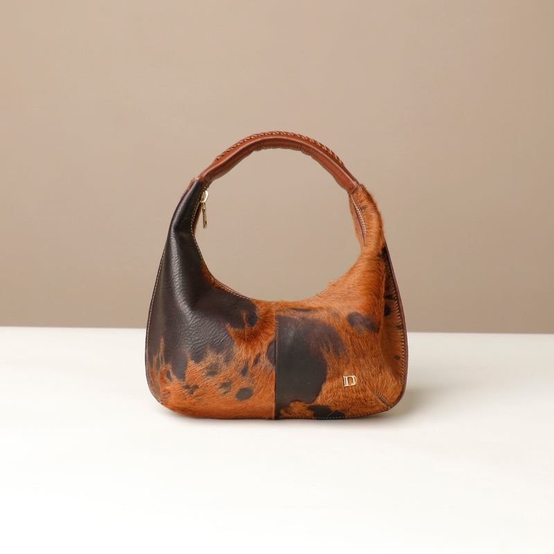 files/hand-bag-soft-rounded-brown-animal-print-leather-danilos.jpg