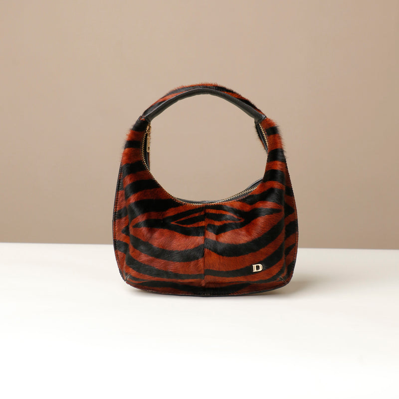 files/hand-bag-soft-rounded-red-black-animal-print-leather-danilos.jpg