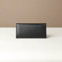 Back view of the Danilos Leather jewelry organizer Mishka in black in a beige background