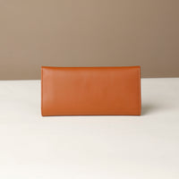 Back view of the Danilos Leather jewelry organizer Mishka in brown in a beige background