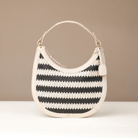 Front view of Luna Palmera raffia tote bag