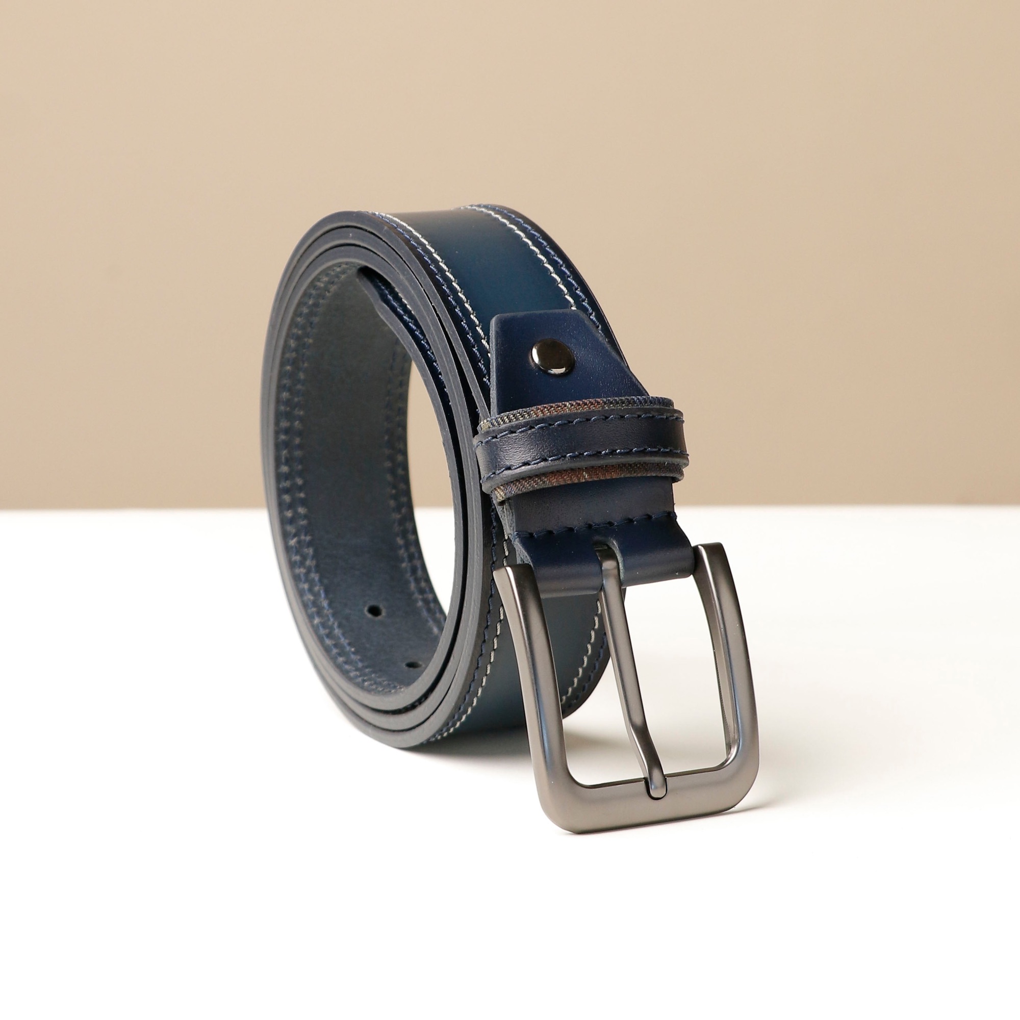 Hand-stitched leather belts